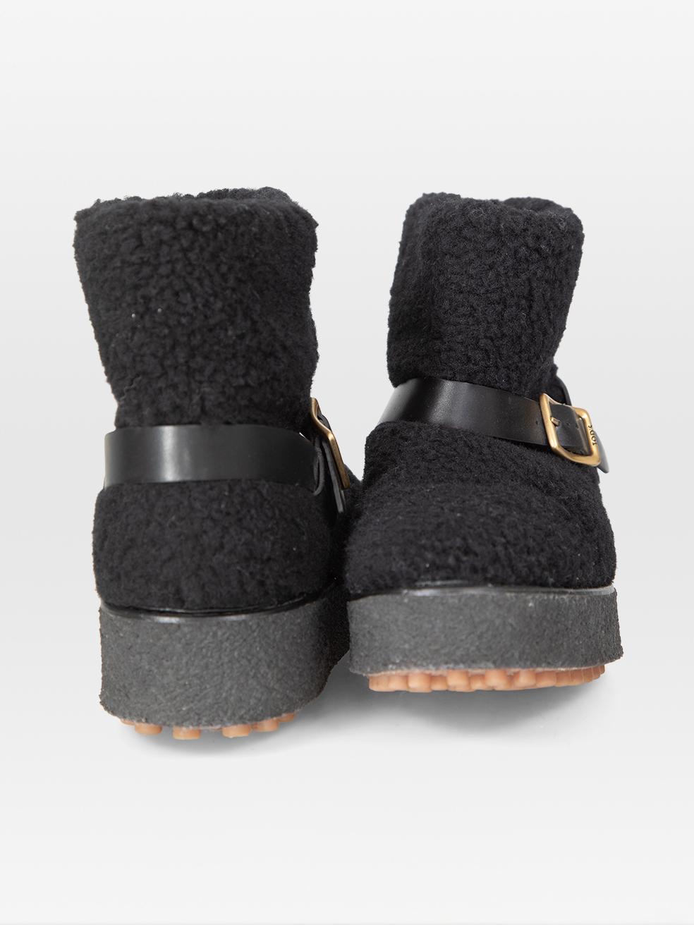 Nero Stivaletti Tod's neri in finto shearling Taglia IT 38,5 in vendita