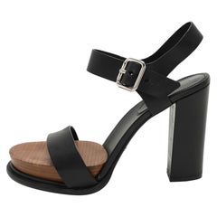 Sandali con cinturino alla caviglia in pelle nera Tod's taglia 41