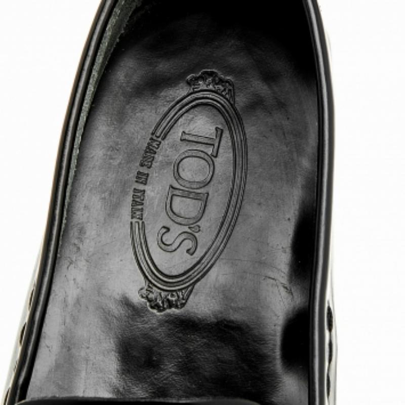 Noir Tod's Mocassins à boucle en cuir noir Taille 44.5 en vente