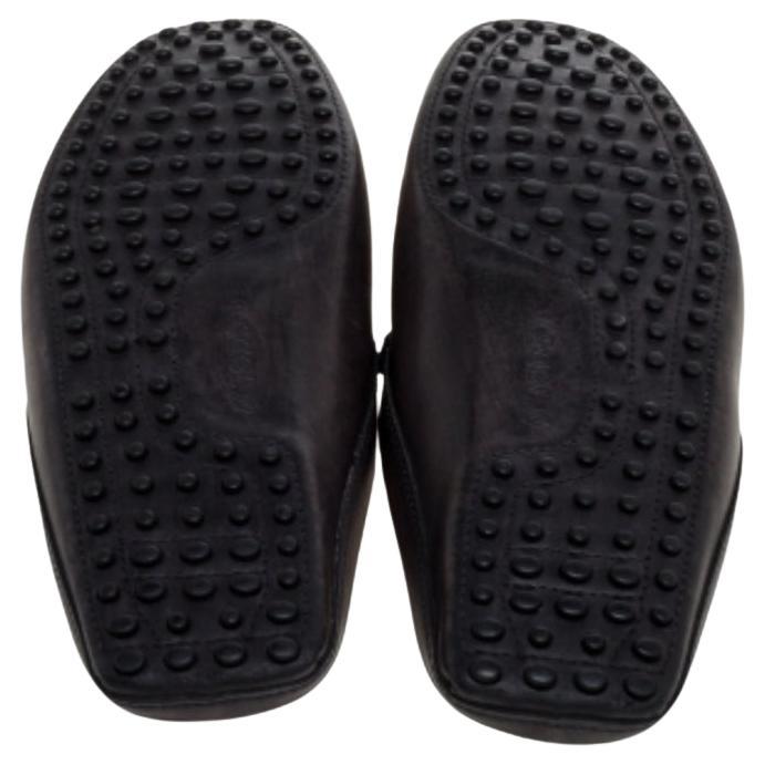 Comfortable and fashionable, these flat loafer mules from Tod's are worth every penny you spend! The black mules are crafted from leather and feature an open back design. They flaunt round toes and leather-lined insoles. Grab them today and