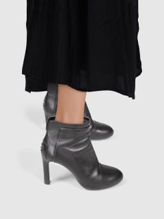 Tod's Schwarze Lederstiefel mit Absatz und Nieten Größe IT 37.5