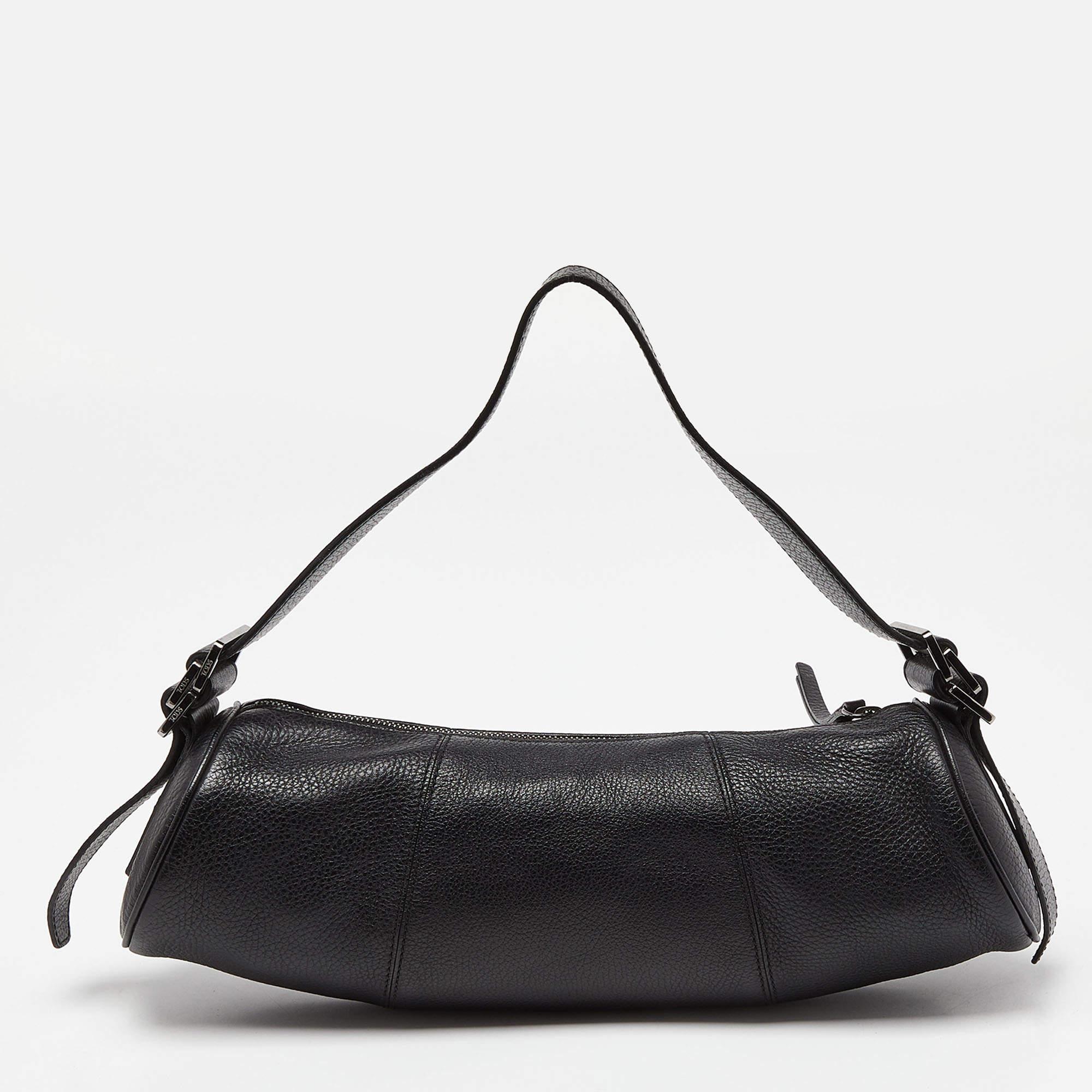 Los bolsos de diseño son los compañeros ideales para un sinfín de ocasiones Aquí tenemos una pieza que aúna moda y funcionalidad, elaborada con precisión. Está equipado con un interior de buen tamaño en el que caben fácilmente todos tus objetos