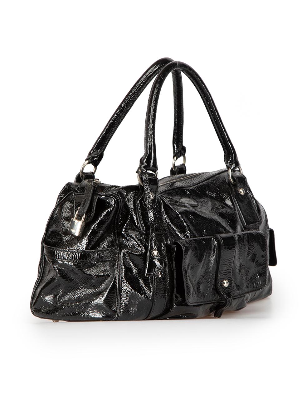 CONDITION is Very good. Minimal wear to handbag is evident. Minimal discolouration to inner lining and minor sticky residue to outer leather on this used Tod's designer resale item. This bag comes with the original dustbag.
 
Details
Black
Patent