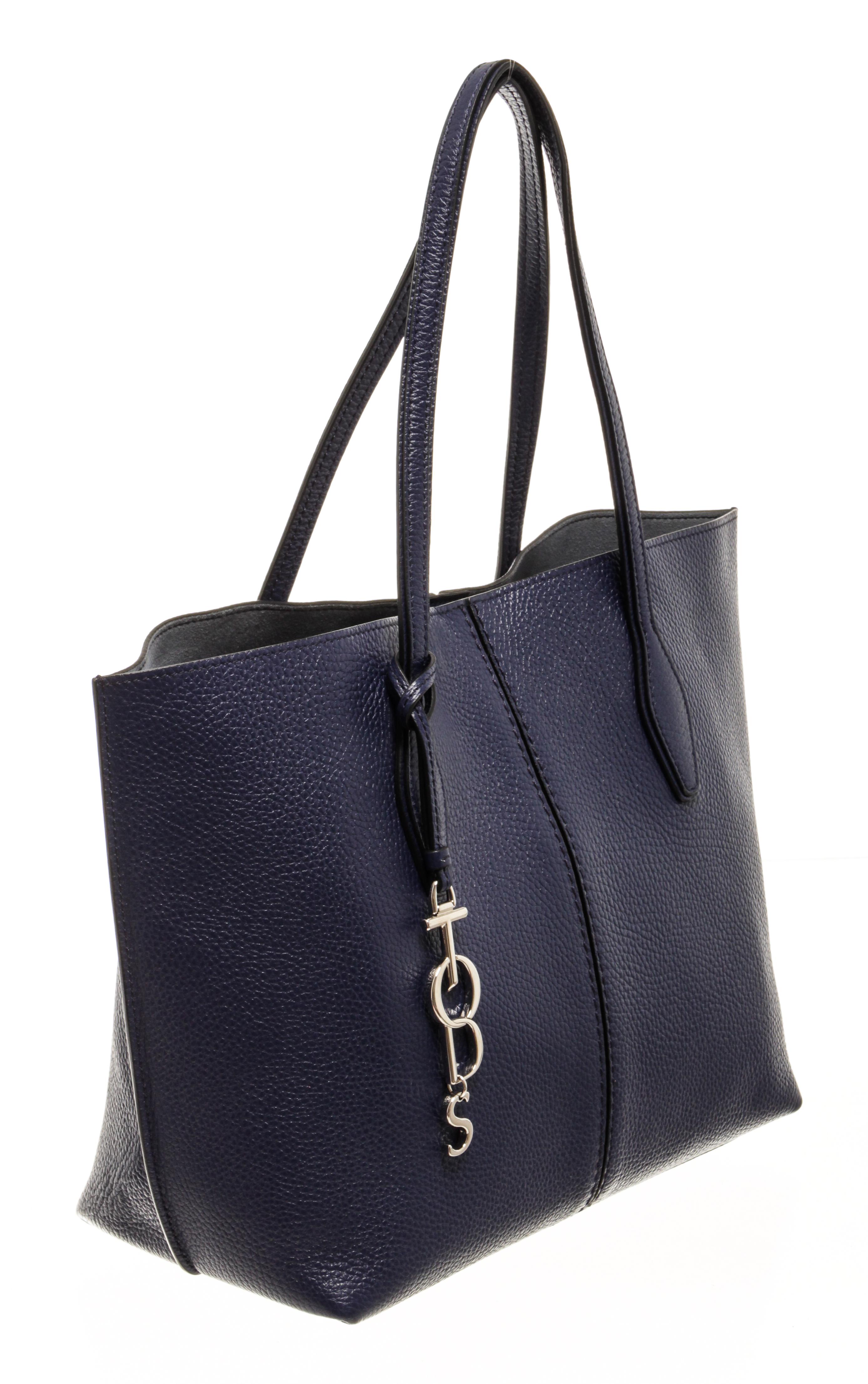 Tod's Blue Leather Joy Medium Tote Bag with metal feet, removable zip pocket, removable internal pockets, metal logo charm, snap button closing

86165MSC