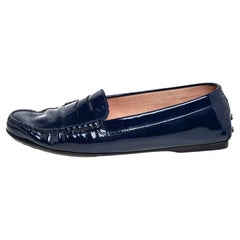 Tod's Blaue Penny Loafers aus Lackleder Größe 39