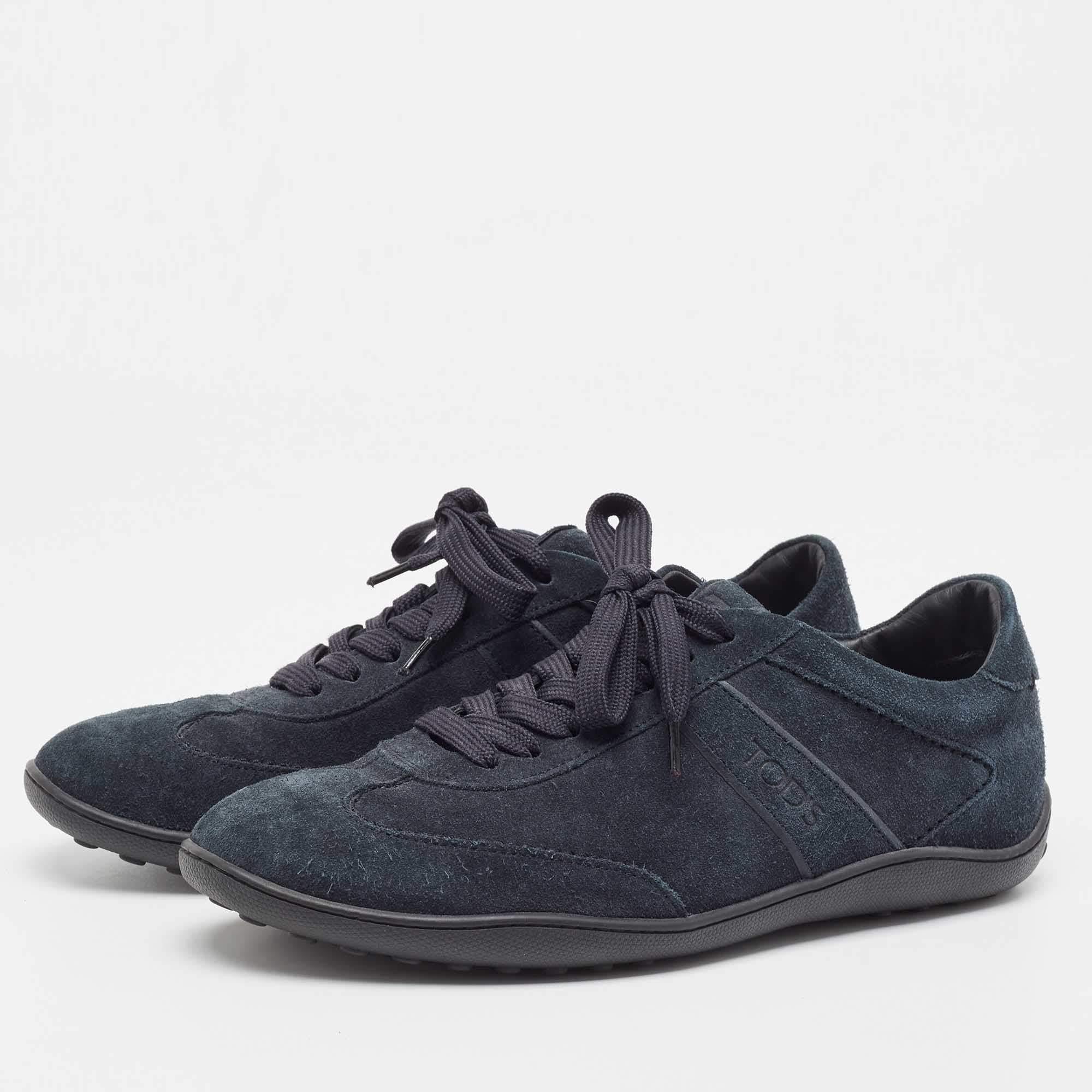 Indulge in luxe comfort with these designer sneakers from the house of Tods. Featuring lace ups and logo details they are crafted from quality materials and finished with rubber soles. The perfect addition to a multitude of casual outfits and