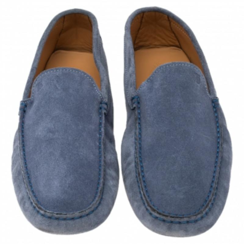 Stylish and super comfortable, these slip-on loafers by Tod's will make a great addition to your shoe collection. They have been designed using suede and styled with round toes. Leather insoles and pebbled outsoles beautifully complete these blue