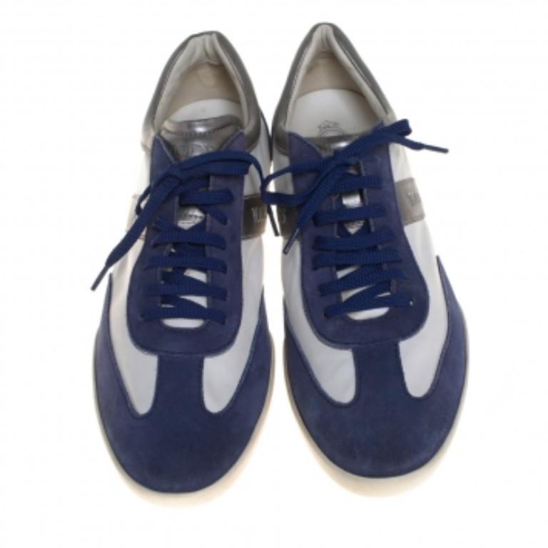 These blue & white sneakers from Tod's are drool-worthy. Made of a combination of suede and leather, these sneakers feature lace-ups at the front and are equipped with leather-lined insoles. They come with tough pebbled soles that provide maximum