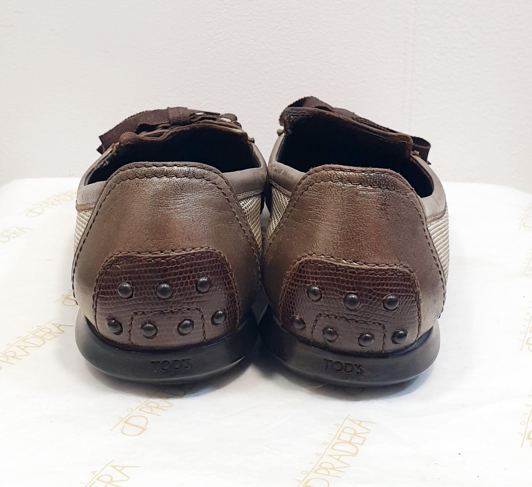 Black TOD'S brown ballerinas with  round toe and lace  bow For Sale