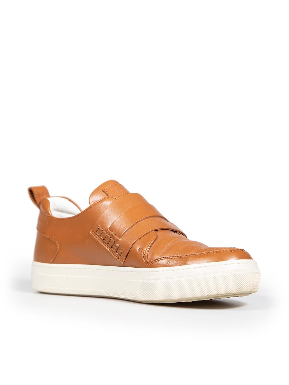 CONDITION is Very good. Minimal wear to the trainers is evident, there is general creasing to the leather on the front of the shoes. The platform of the trainers has discolouration and the right shoe has some mild abrasions to the tip of the toe on