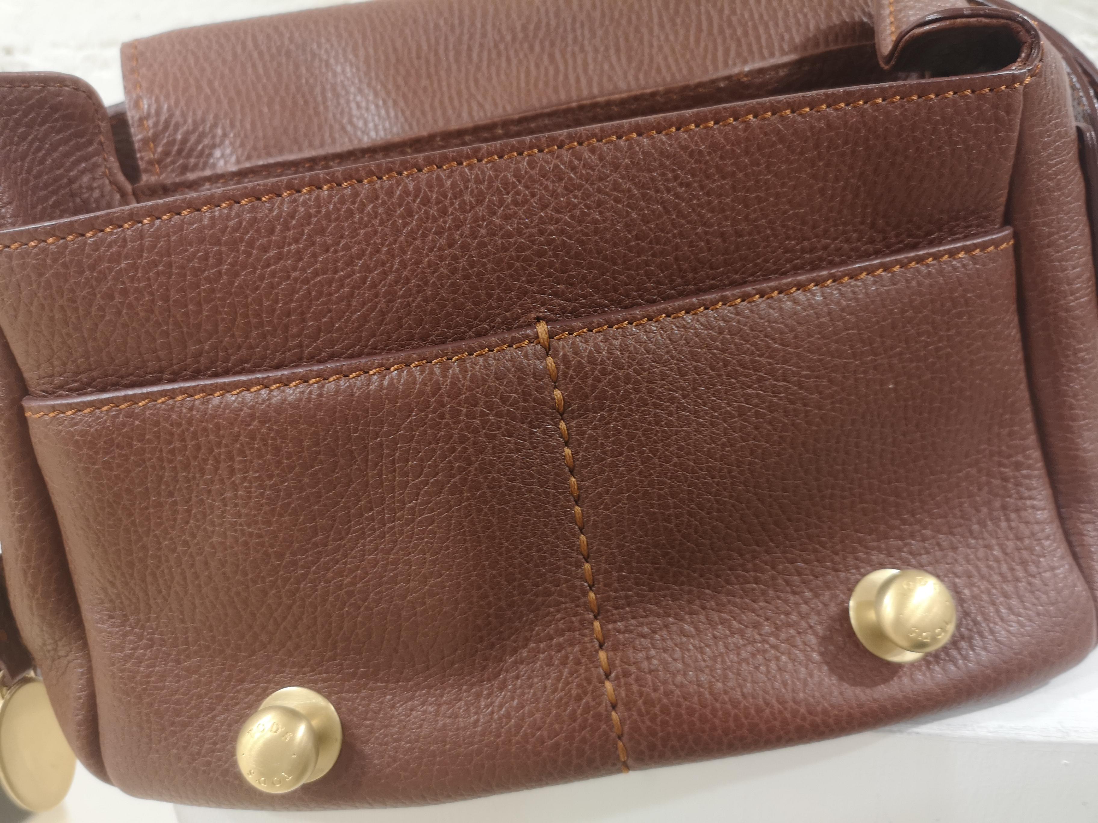 tods clutch bag