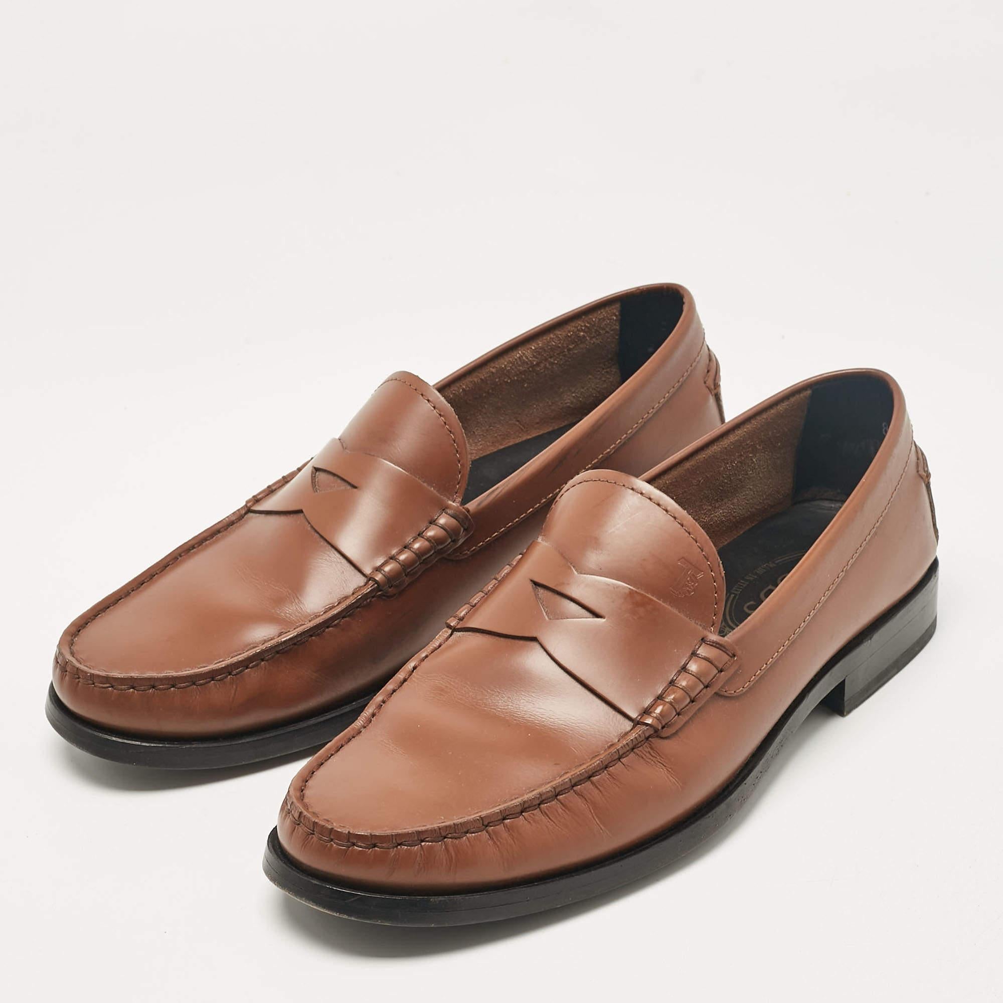 Let comfort and classic style be yours with these designer loafers from Tods. Crafted with skill the high quality shoes have the perfect construction to take you through the day with ease.