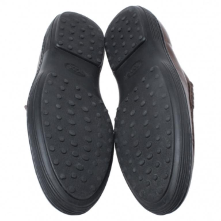 Eleganti e comodissimi, questi mocassini di Tod's saranno un'ottima aggiunta alla tua collezione di scarpe. Sono state realizzate in pelle e dotate di cinturini Penny. I sottopiedi in pelle e le suole in gomma con ciottoli completano magnificamente