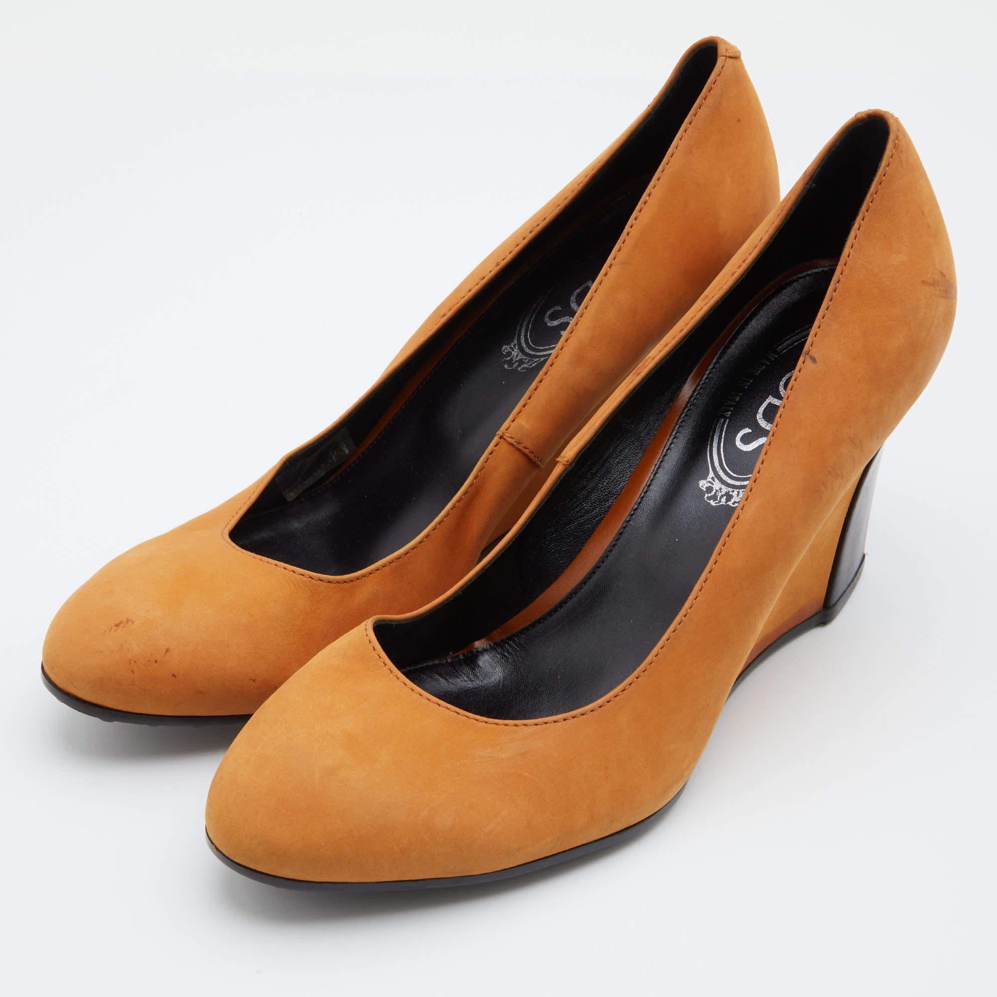 Exhibit an elegant style with this pair of pumps. These designer pumps are crafted from quality materials. They are set on durable soles and high heels.