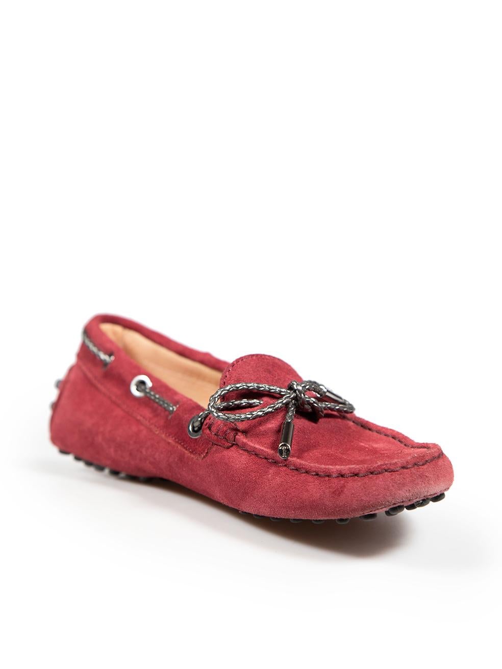 CONDITION is Very good. Minimal wear to the shoes is evident. There is mild discolouration to the front tips of both shoes on this used Tod's designer resale item.
 
 
 
 Details
 
 
 Burgundy
 
 Suede
 
 Loafers
 
 Round toe
 
 Flat heels
 
 Silver