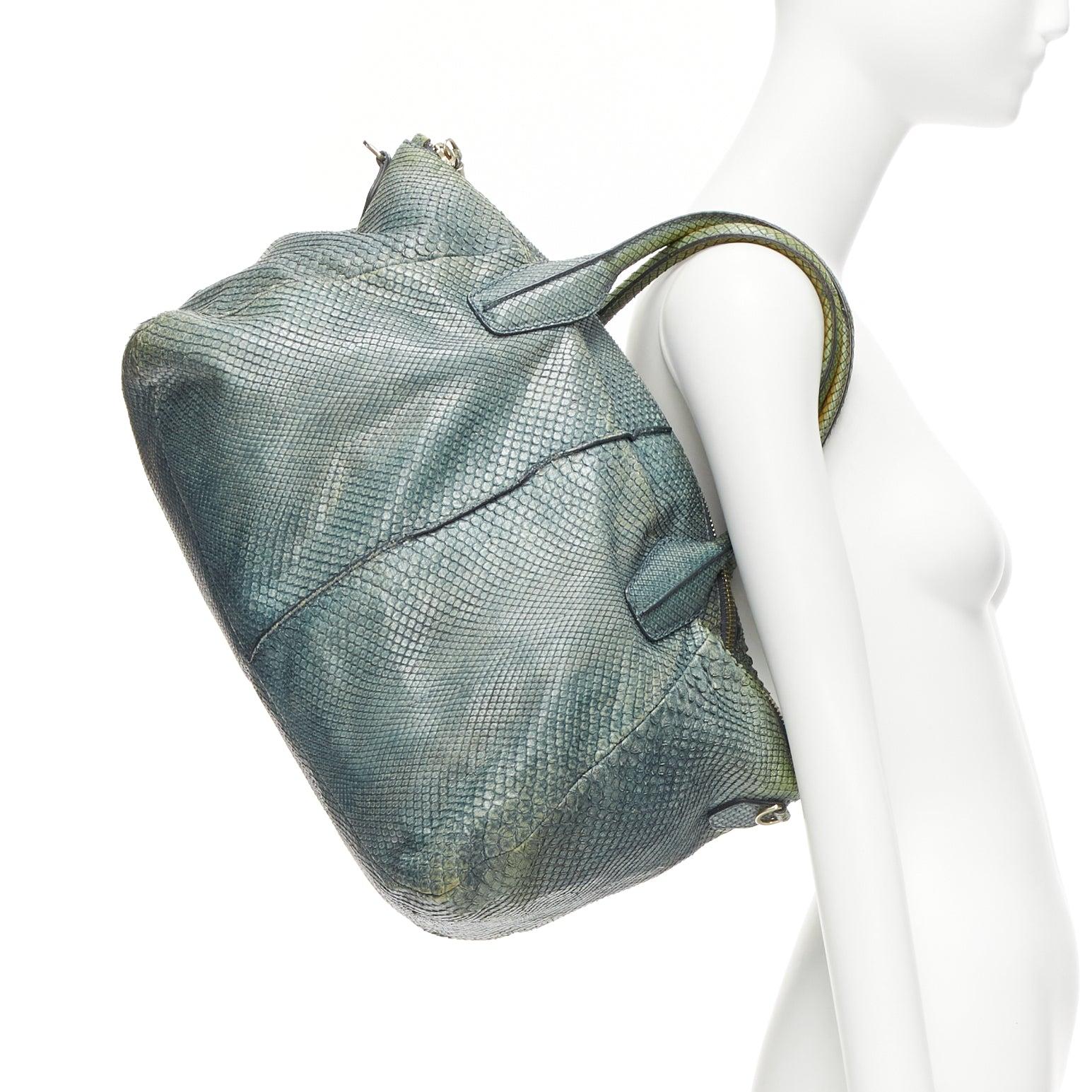 TOD'S D-Styling Bag blue green scaled leather panelled top handle tote
Reference: MGOR/A00002
Brand: Tod's
Model: D Bag
Material: Leather
Color: Green, Blue
Pattern: Animal Print
Closure: Zip
Lining: Blue Fabric
Extra Details: TOD'S D-Styling 2
