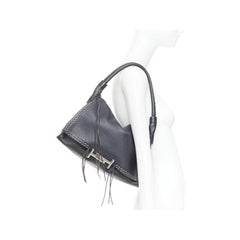 Tod's Double Double T in pelle di vitello nera con frange a trama grommet, borsa hobo a spalla