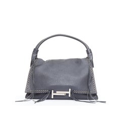 TOD
S Double Double T black calfskin grommet weave fringe shoulder hobo bag TOD
S Double Double T black calfskin grommet weave fringe shoulder hobo bag