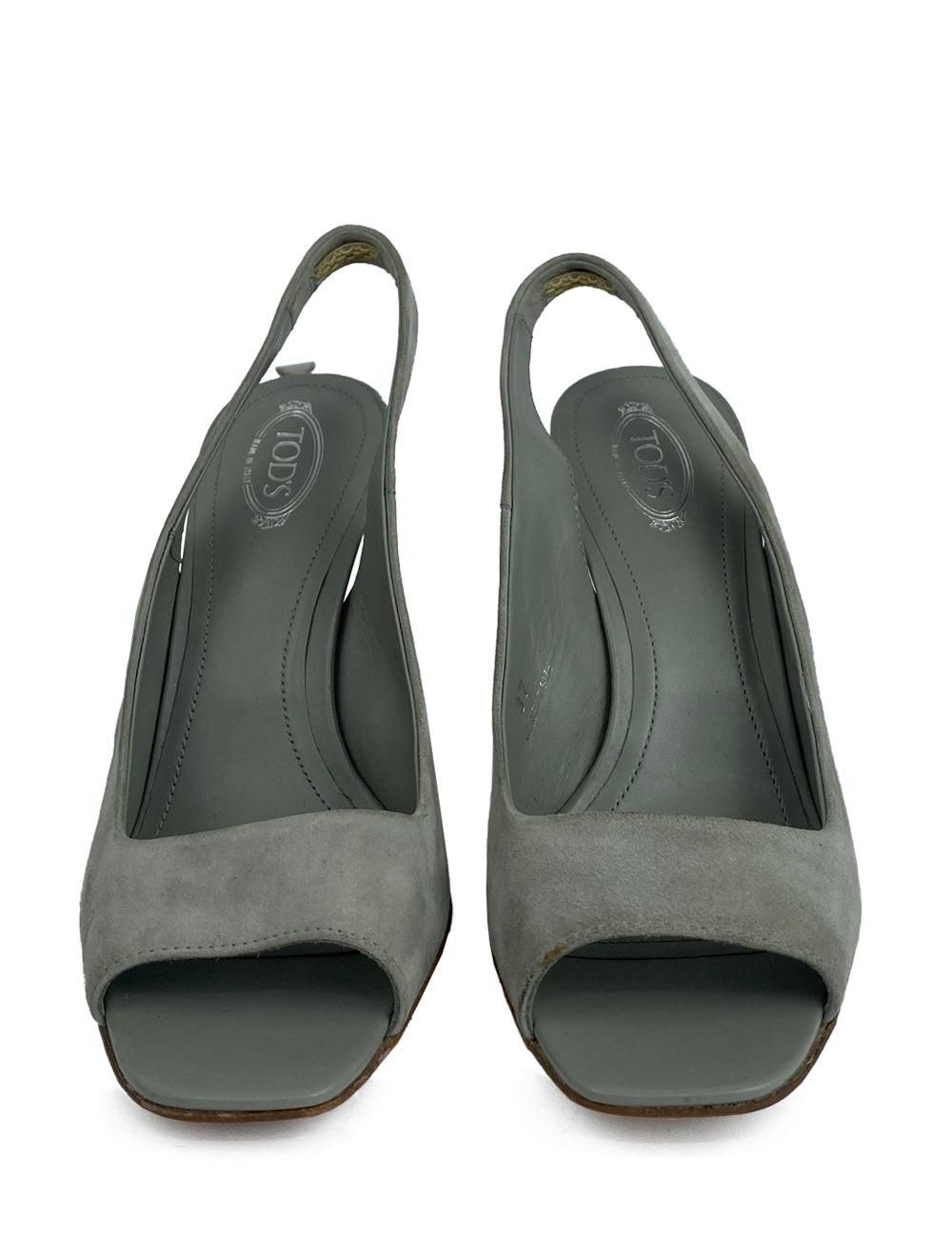 Tod's grey suede open-toe sling back heels. 

Additional information:
Material: Leather
Size: EU 37
Measurements:
 Heel Length: 9 cm
Overall Condition: Good
Interior Condition: Signs of use
Exterior Condition: Leather scuffing and some visible