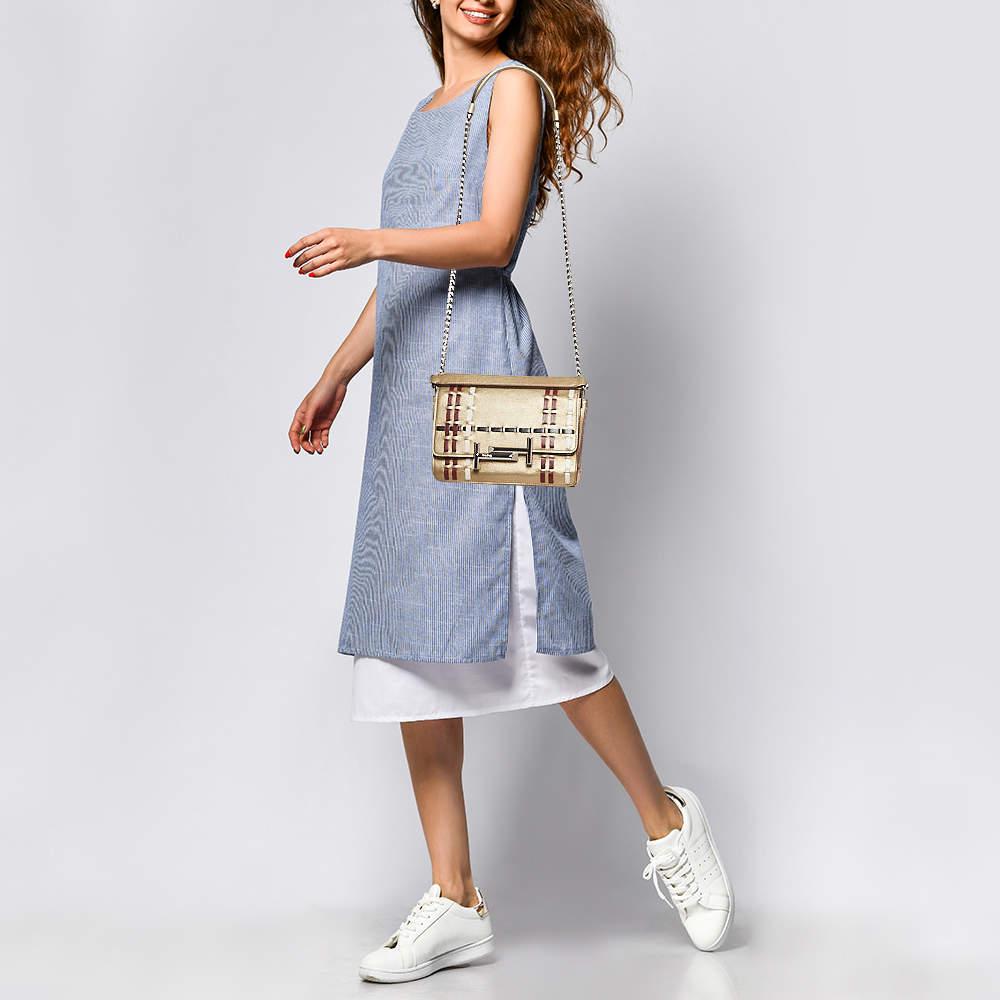 Designer bags are ideal companions for ample occasions! Here we have a fashion-meets-functionality piece crafted with precision. It has been equipped with a well-sized interior that can easily fit all your essentials.