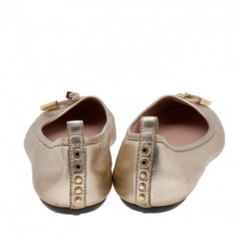 Women's Tod's Gold Leather Tassel Ballet Flats Size 38 For Sale