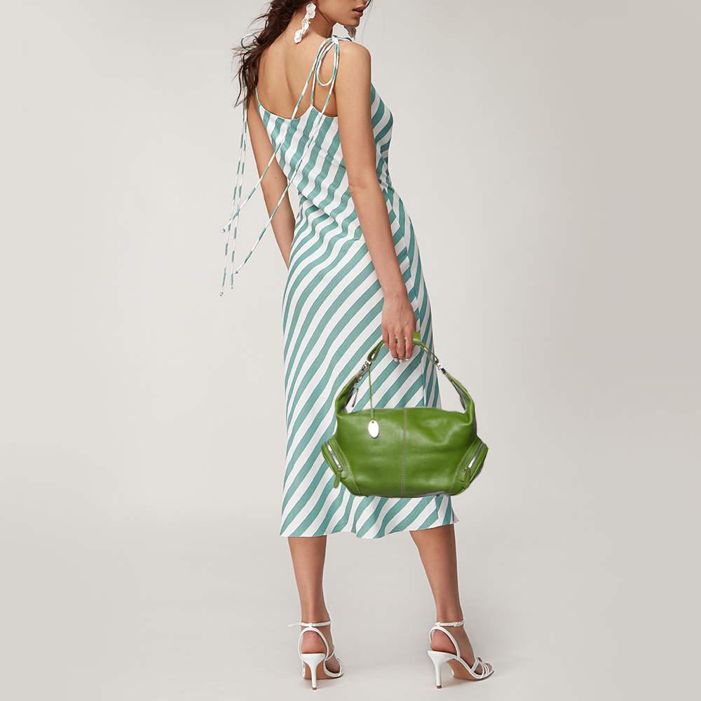 This Charlotte hobo from Tod's definitely needs to be on your wishlist. The green hobo is crafted from leather and features a single handle strap with an attached logo charm, zip pockets at the sides and protective pebbled feet. The top zipper opens