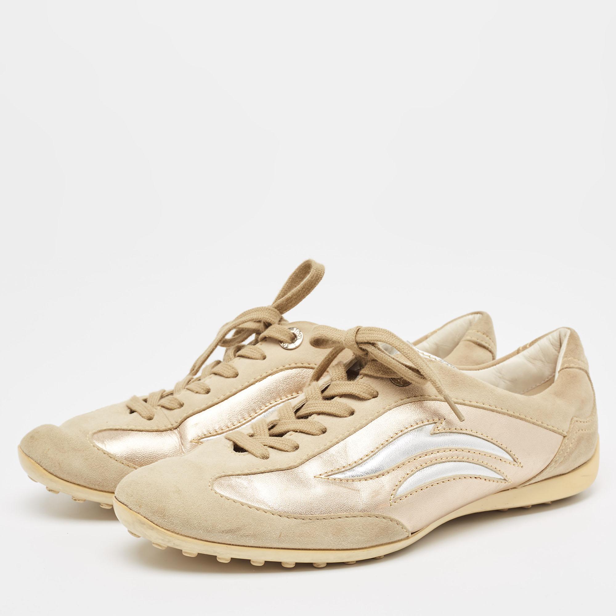 Coming in a classic silhouette, these designer sneakers are a seamless combination of luxury, comfort, and style. These sneakers are finished with signature details and comfortable insoles.