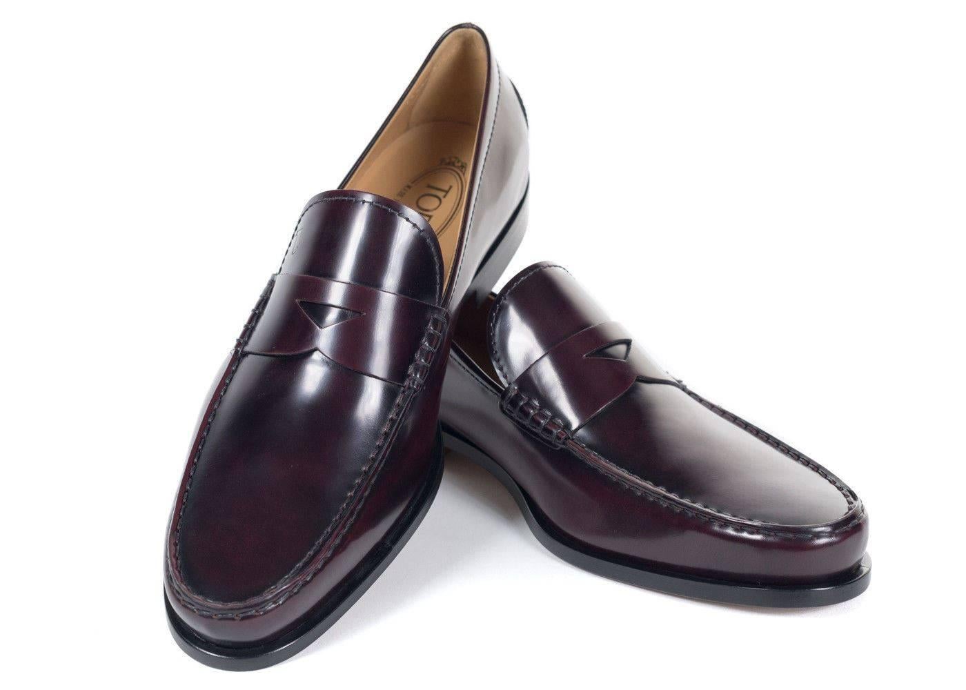 Brand new in Original Box and Dust Bag
Retails in Stores and Online for $450
Size UK9 / US10
All Shoes are in UK Sizing

Richly polished burgundy leather shapes a refined penny loafer styled with a stacked heel and durable rubber sole. The Boston