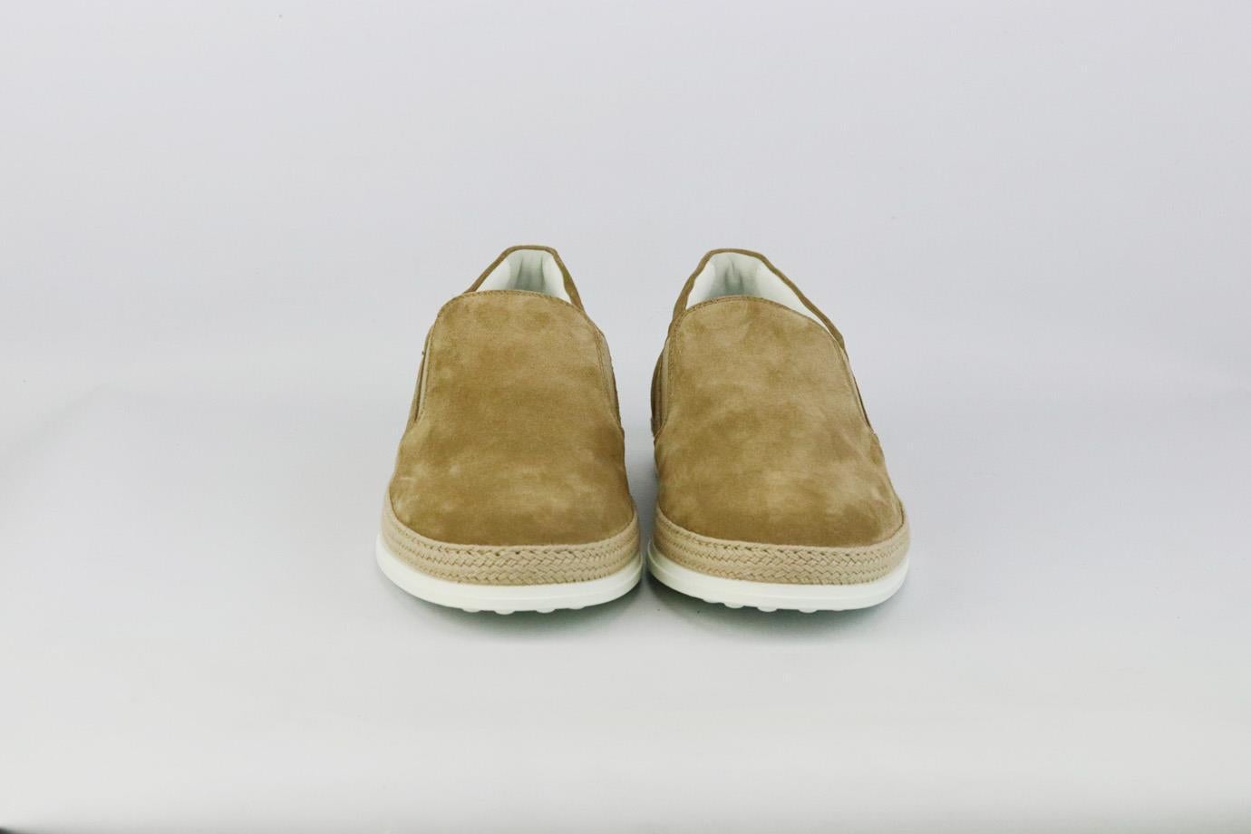 These shoes by Tod’s work well with pretty much anything, they're made from supple logo-printed suede and have elasticated inserts that make them easy to slip on and off. Rubber sole measures approximately 25 mm/ 1 inches. Beige suede. Slip on. Does