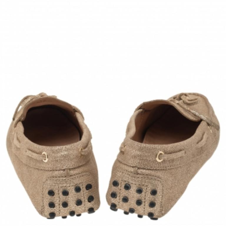 Marrone Mocassini con fiocco in tela oro metallizzato Tod's taglia 42 in vendita