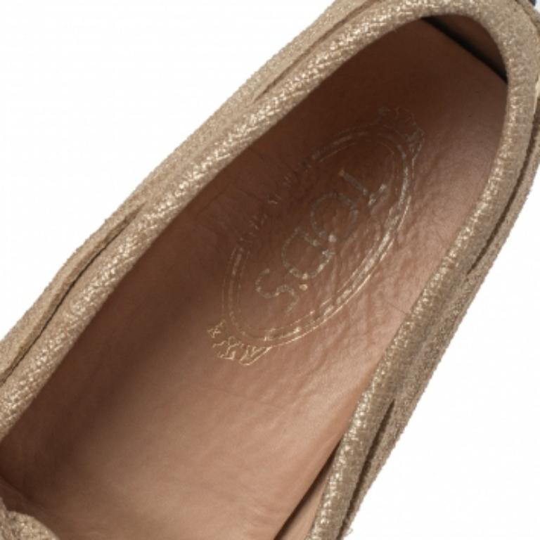 Uomo Mocassini con fiocco in tela oro metallizzato Tod's taglia 42 in vendita