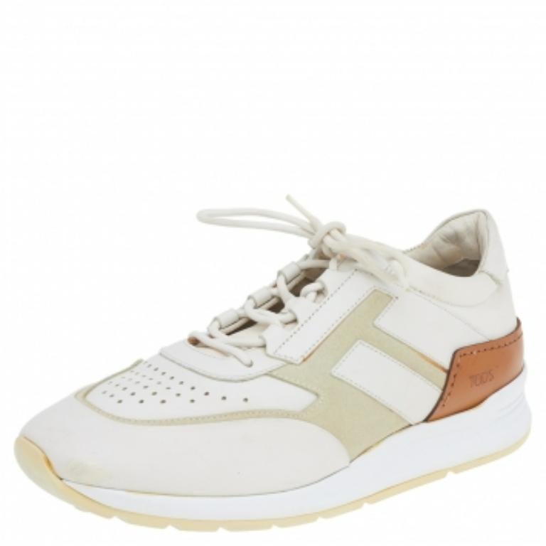 Ces baskets de Tod's sont à tomber par terre. Conçues dans une combinaison de cuir, de daim et de tissu, ces baskets présentent des lacets à l'avant et sont dotées de semelles intérieures doublées de cuir. Elles sont dotées de semelles robustes à