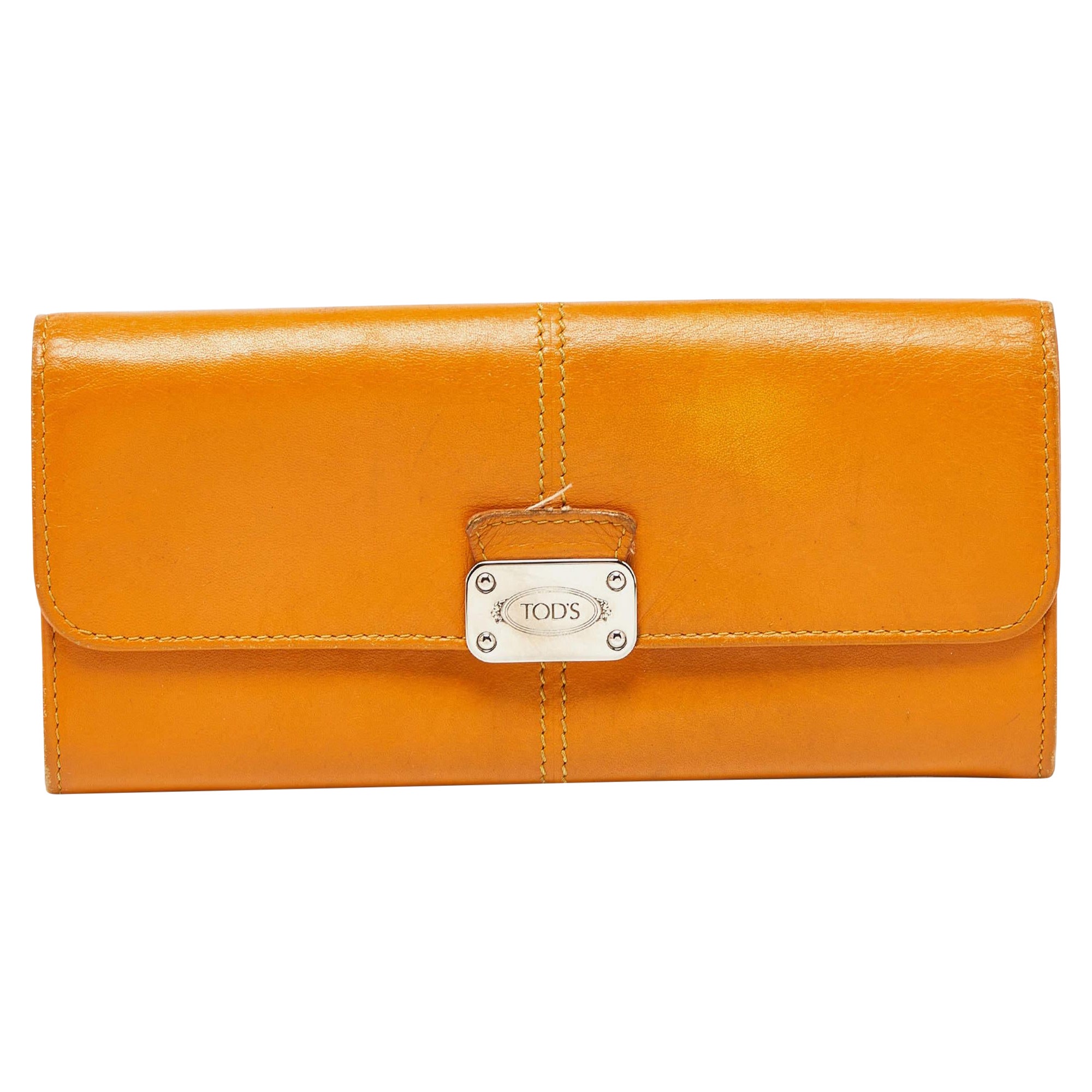 Tod
s Mustard Leather Plaque Logo Continental Flap Wallet