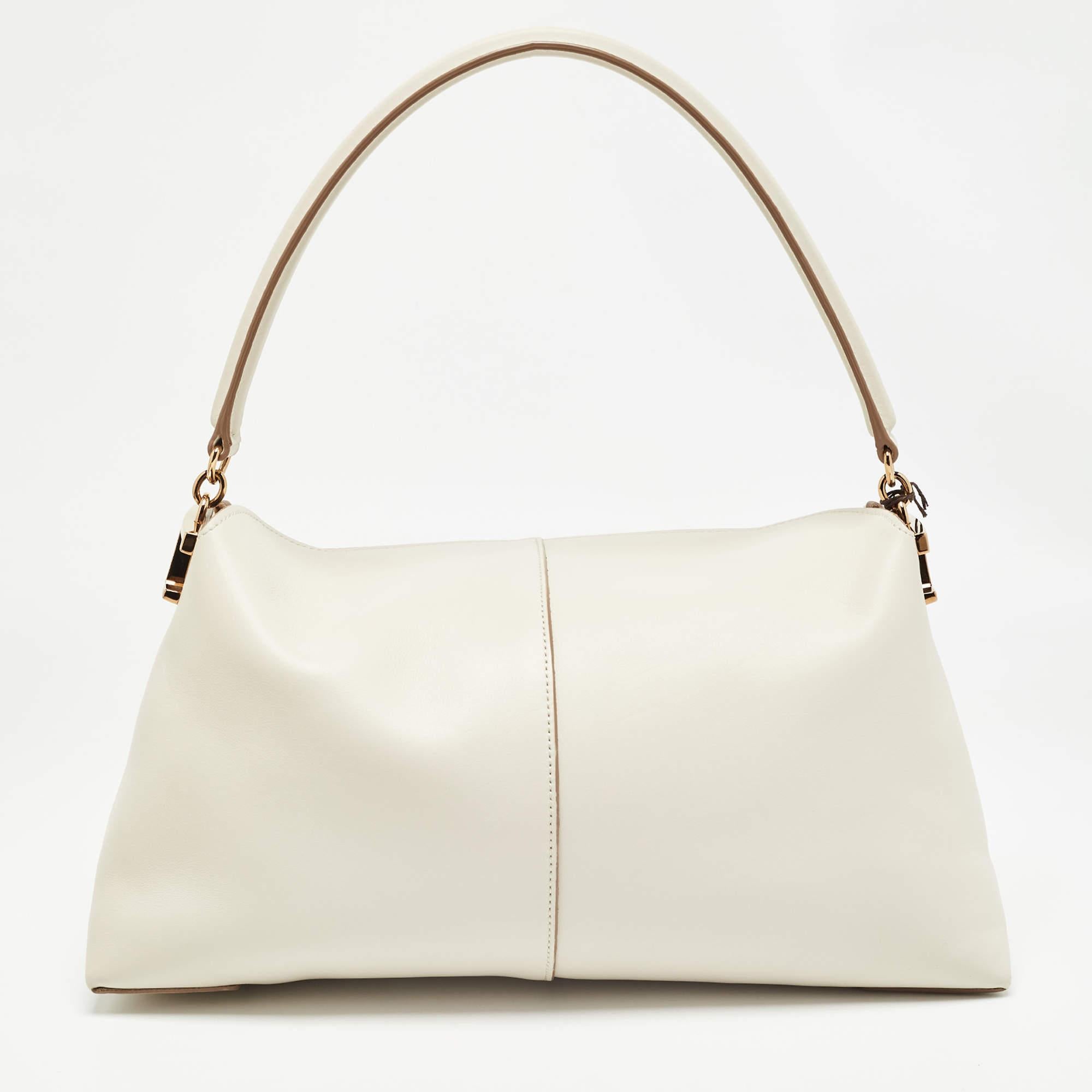 Tod's Bolso bandolera Tod's Off White Leather Small T Case en Excelente estado para la venta en Dubai, Al Qouz 2