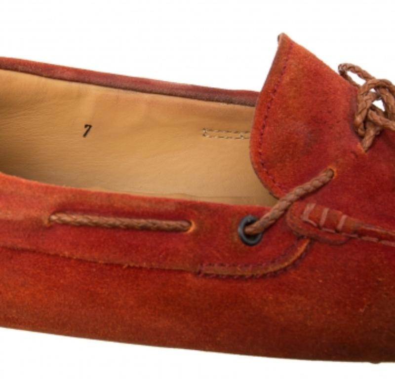 Rendered from suede on the exterior, these Tod sneakers will make you look trendy and smart. They are enhanced with bows on the vamps, studs on counters, and outsole. Lined with leather, their slip-on size will make sure you have a smooth walk.