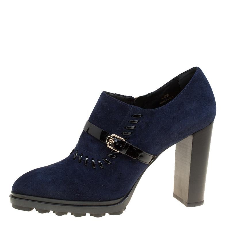 Tod's is a favourite worldwide when it comes to chic and modern choices and these booties are a testimony to that. The blue pair is crafted from suede and flaunts almond toes, smart gold-tone buckled strap detailing at the centre and comfortable