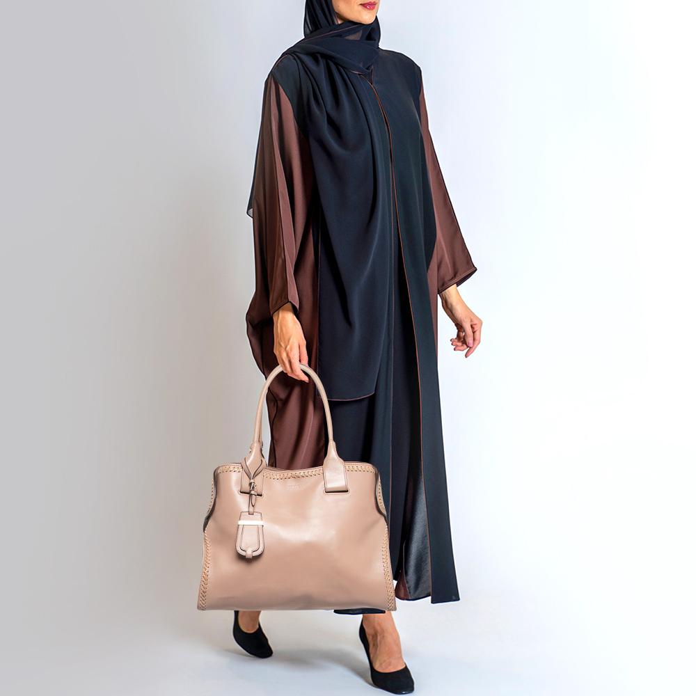 Be it your daily commute to work, shopping sprees, and vacations, this Tod's tote bag will never fail you. This designer creation is made to last and assist you in your fashion-filled days.