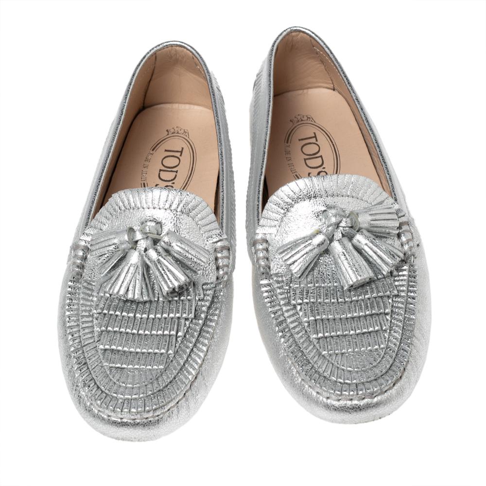 These loafers from Tod's are not only high on appeal but also very skillfully made. They are crafted from silver leather and designed with tassels on the uppers and rubber pebbling on the soles. The loafers have a lovely shape and will complement