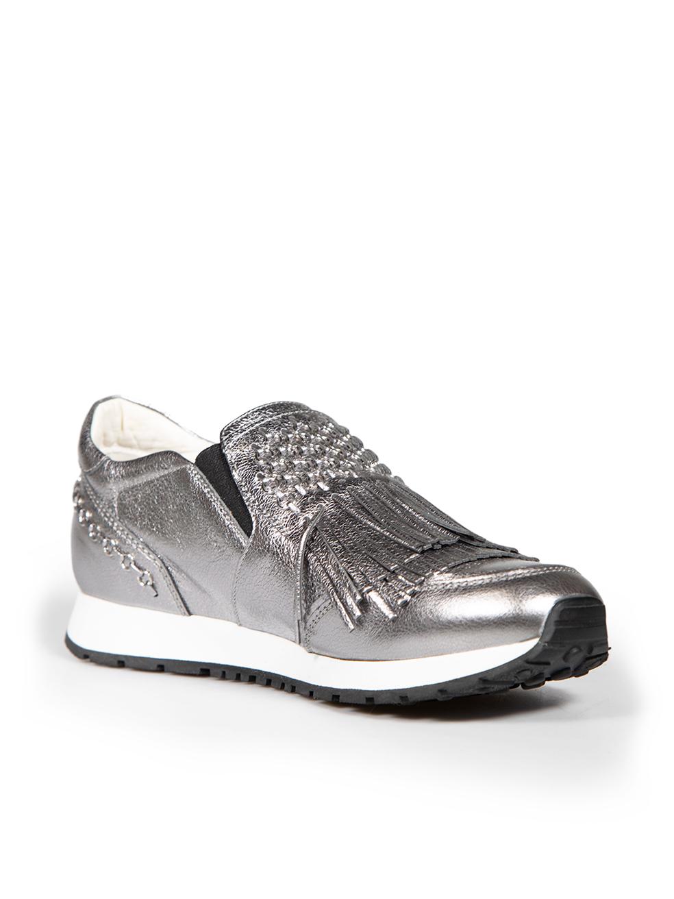 CONDITION is Very good. Minimal wear to trainers is evident. Minimal wear to inside heel, where there is discolouration to the leather on this used Tod's designer resale item.
 
 
 
 Details
 
 
 Silver
 
 Leather
 
 Trainers
 
 Slip on
 
 Round