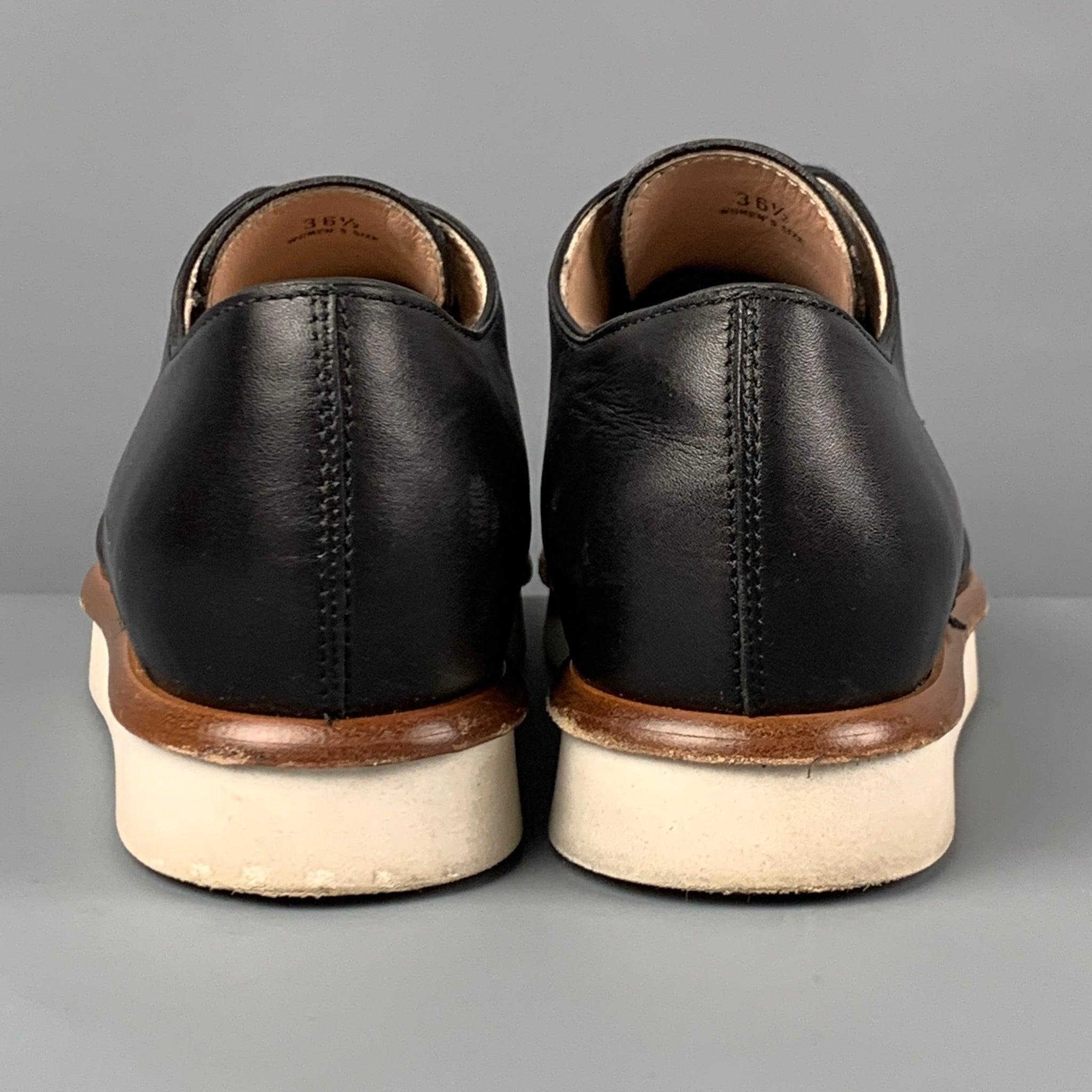 TOD'S Taille 6.5 Chaussures à lacets en cuir noir en vente 1