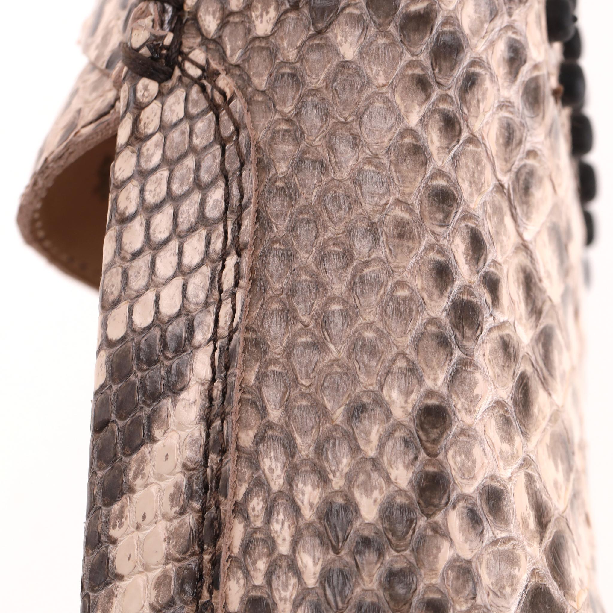 Mocassini in pelle con stampa a serpente di Tod's in vendita 3