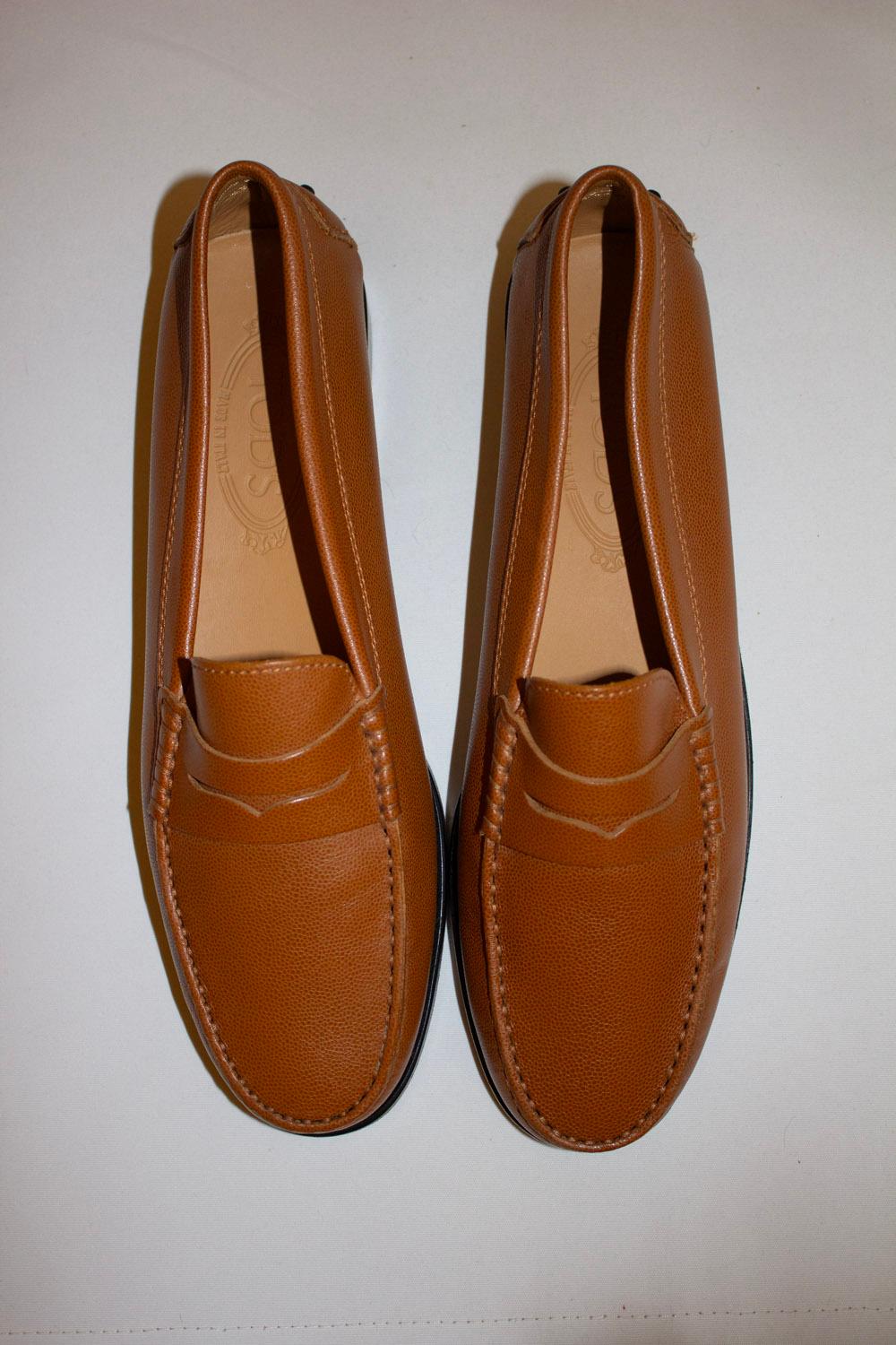  A great pair of tan leather loafers by Tods. In excellent condition  they have leather uppers and leather soles with the bubble detail and on the back of shoe. 
EU size 40. 