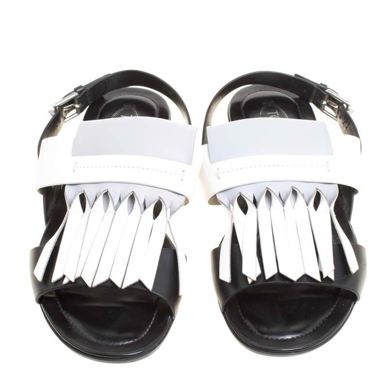 You'll truly be in utter love with these sandals from Tod's as they are stylish and modern. They flaunt simple leather straps in three colours, fringe detailing on the uppers, ankle fastenings, and comfortable insoles. The sandals are just perfect