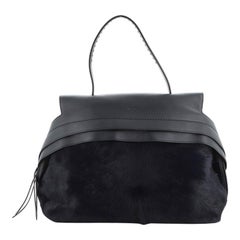 Tod's Studded Wave Charm Bag Leather Black at 1stDibs