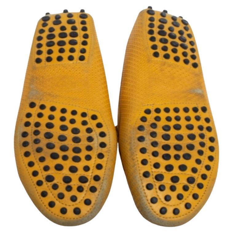 Exude an air of chic style with these lovely loafers from Tod's. These loafers are crafted from leather and feature a perforated pattern all over. Made in Italy, this pair is sure to provide you with maximum comfort with its leather-lined insoles
