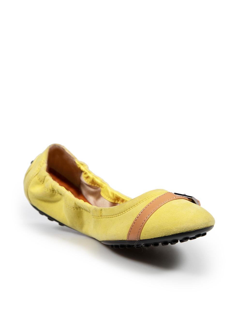 CONDITION is Good. Minor wear to the shoes is evident. The overall colour of the shoe is slightly discoloured on this used Tod's designer resale item.
 Details
 Yellow
 Suede
 Ballet flats
 Round toe
 Silver hardware
 Front belt detail
 
 
 Made in