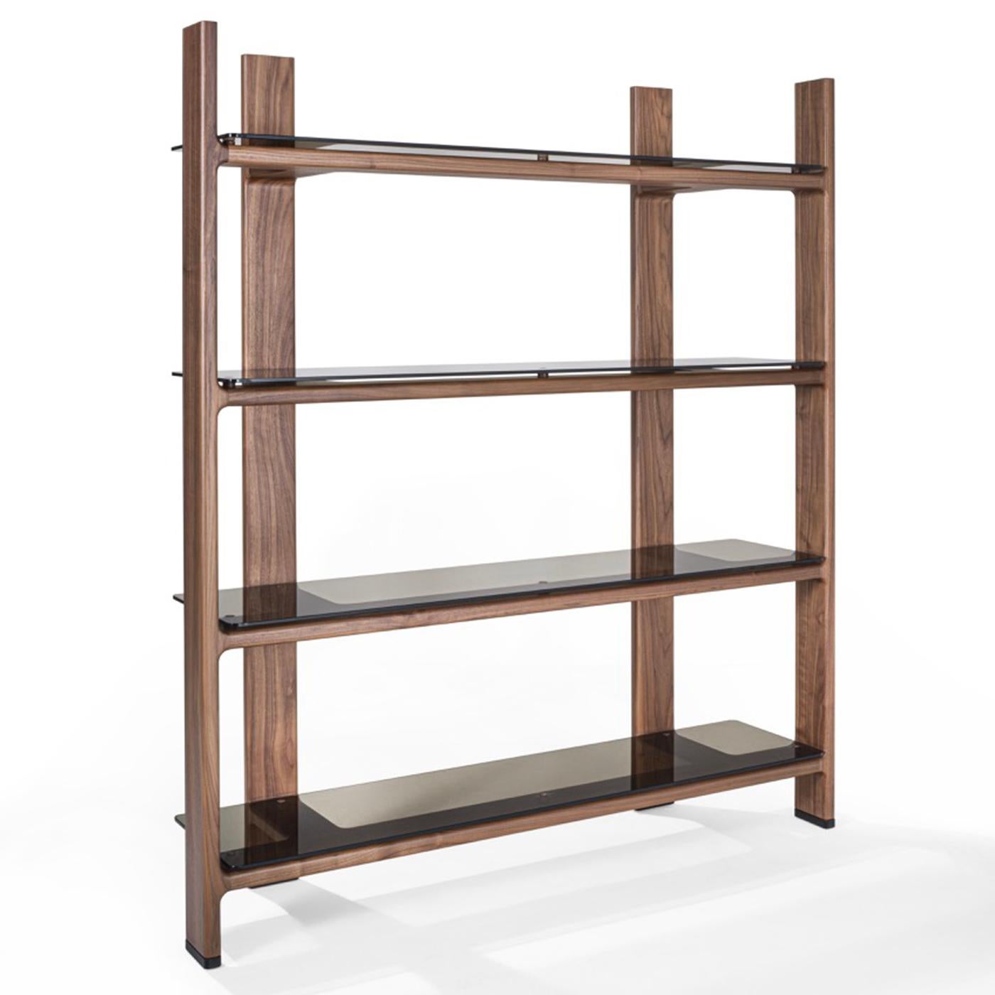 Luxury and simplicity effortlessly merge in this sleek bookcase of modern inspiration, traits making it a piece of outstanding versatility. The solid wooden structure boasts an airy design where natural grain is its only spontaneous and unrepeatable