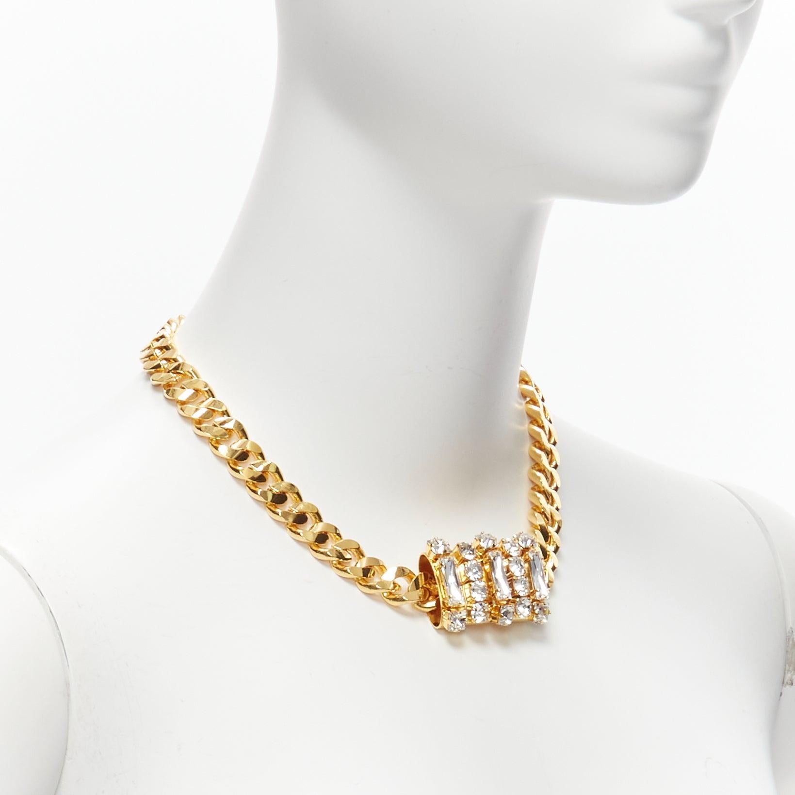 TOGA ARCHIVES clear crystal jewel gold metal bar chain necklace
Reference: BSHW/A00083
Brand: Toga Archives
Material: Metal
Color: Gold, Clear
Pattern: Solid
Closure: Push Clasp
Lining: Gold Metal

CONDITION:
Condition: Excellent, this item was