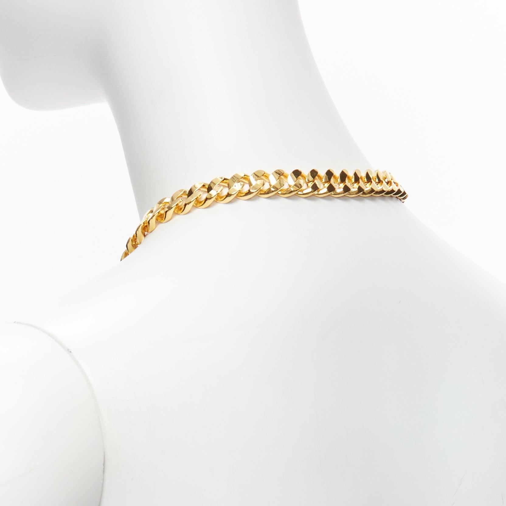 TOGA ARCHIVES Halskette mit goldener Metallstange und klarem Kristallstein Damen im Angebot