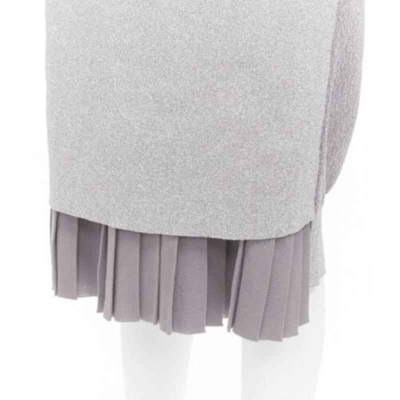 TOGA ARCHIVES metallic silver lurex pleats layered hem ribbed dress FR36 S
Reference: BSHW/A00020
Brand: Toga Archives
Material: Polyester, Cotton
Color: Silver, Grey
Pattern: Solid
Closure: Pullover
Lining: Grey Fabric
Extra Details: Sweater can be